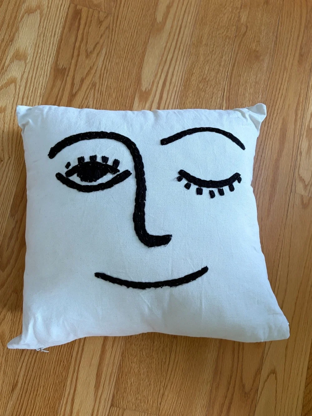 Winking Face Embroidered Throw Pillow - Off White with Black Accent